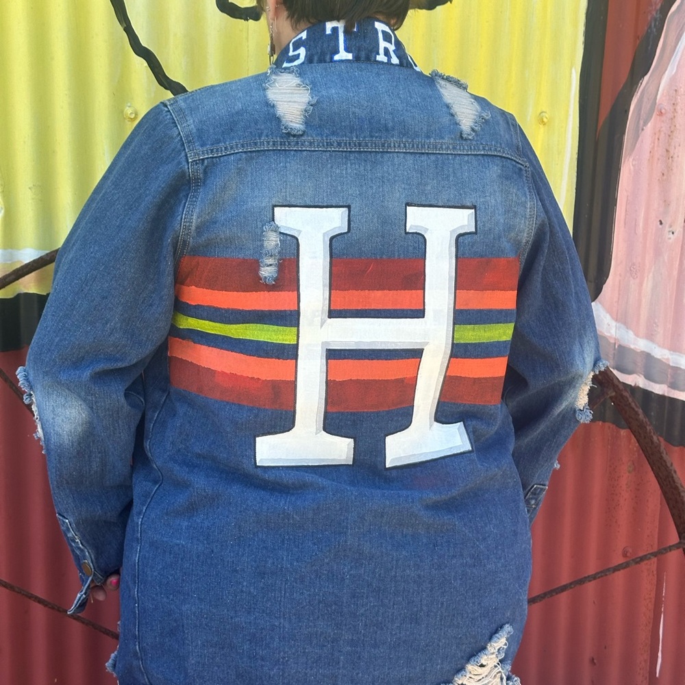 Astros inspired Blue Jean Jacket with Multicolor Stripes. Distressed features.